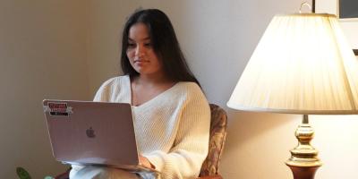 Student working on a laptop from home