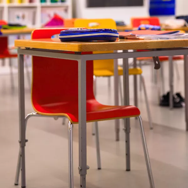 Child's desk in an elementary school classroom